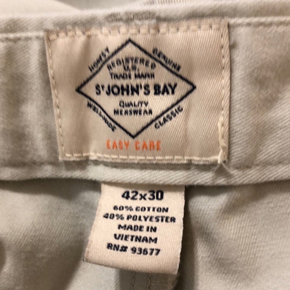 St. John’s Bay casual pants, cream in color.  42X30.60% cotton and 40% polyester